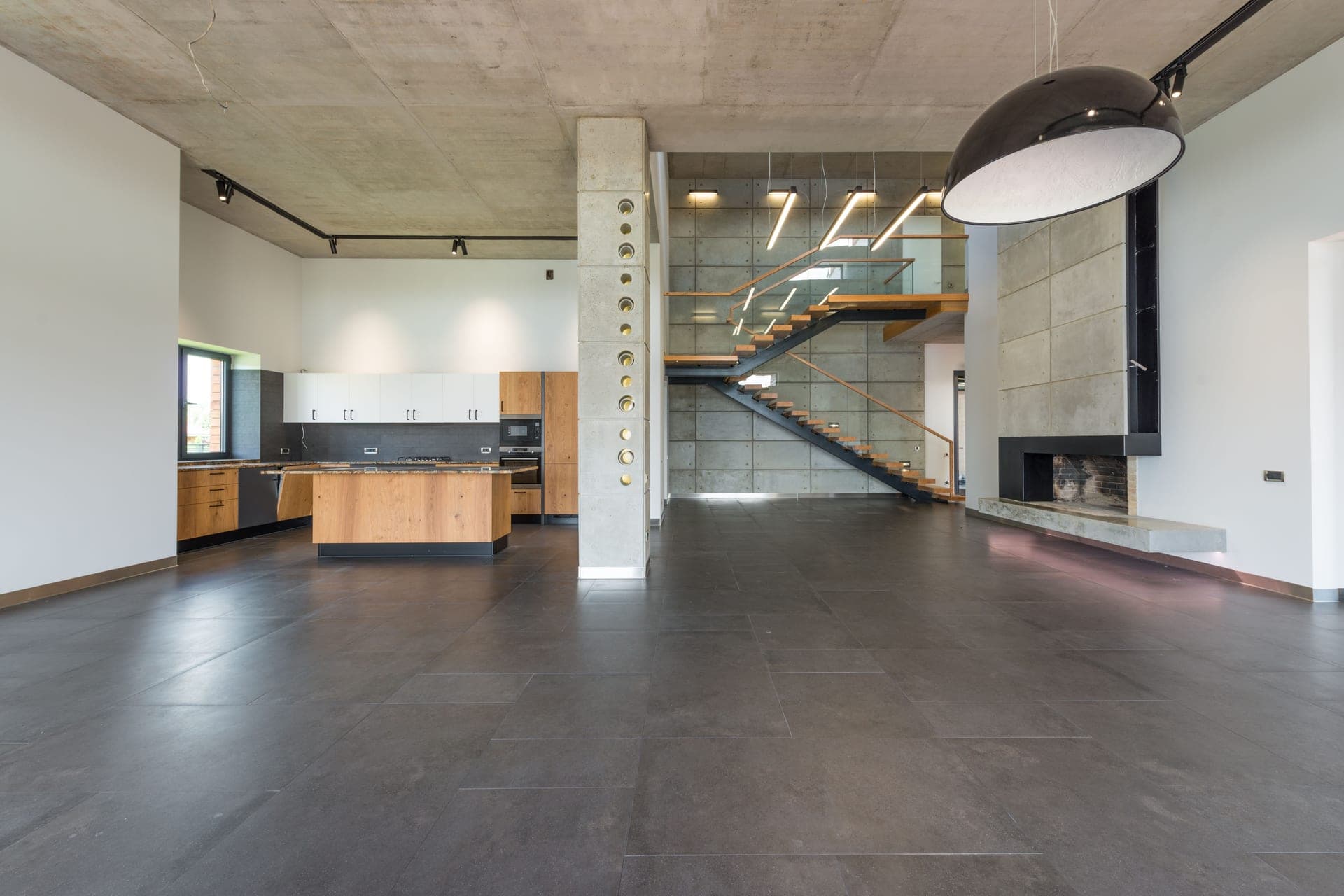 An open-plan hallway and kitchen in a large contemporary home