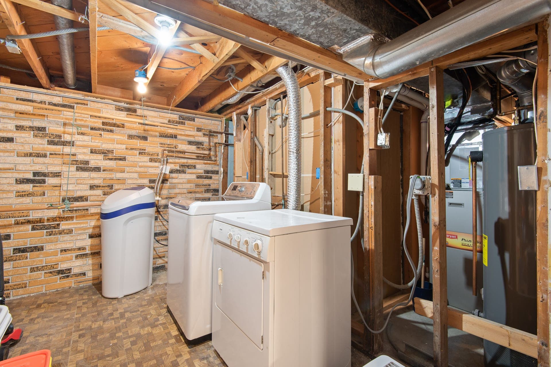 A clean, well-lit basement utility room