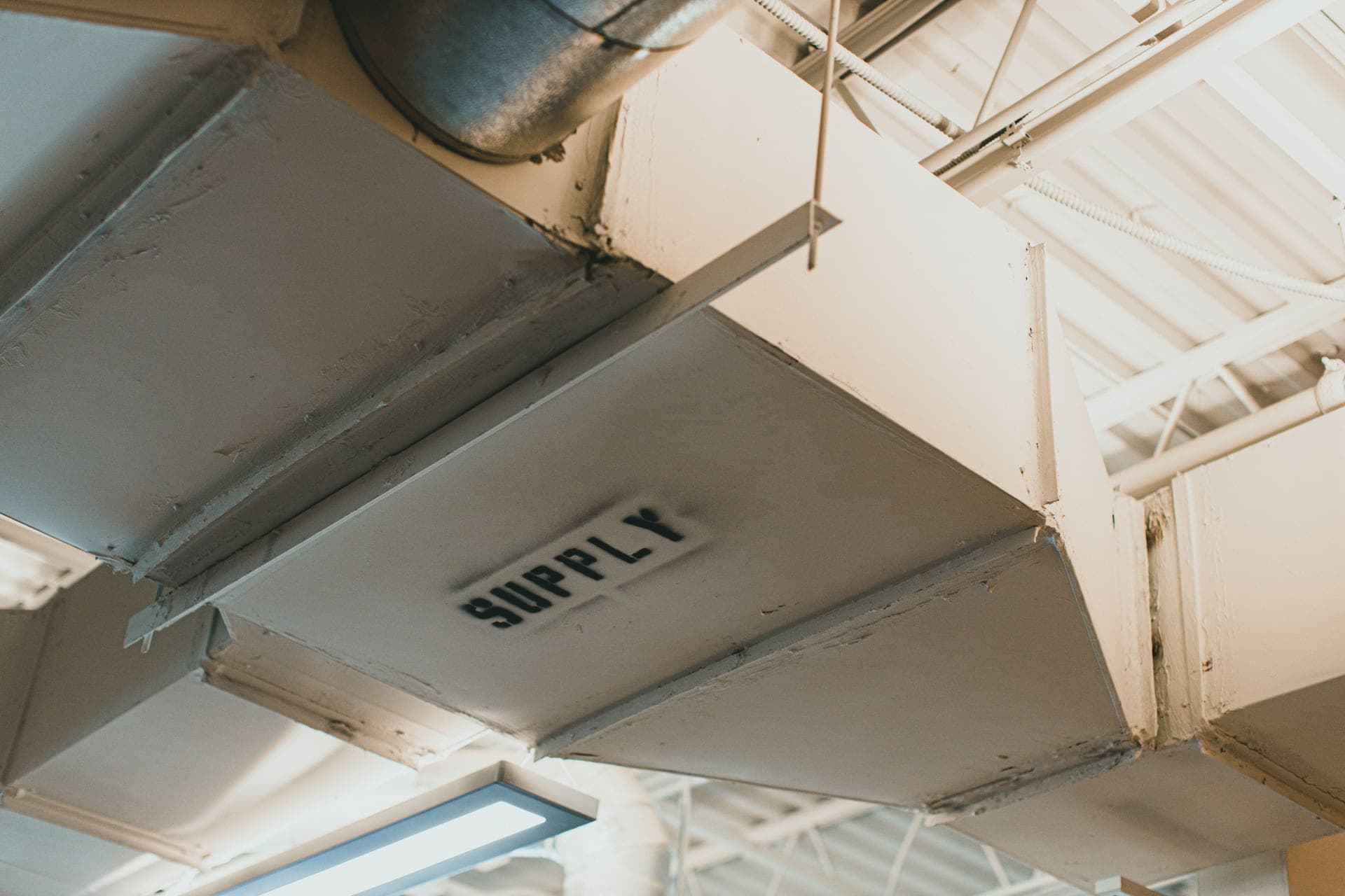 Sheet metal ductwork with a supply label