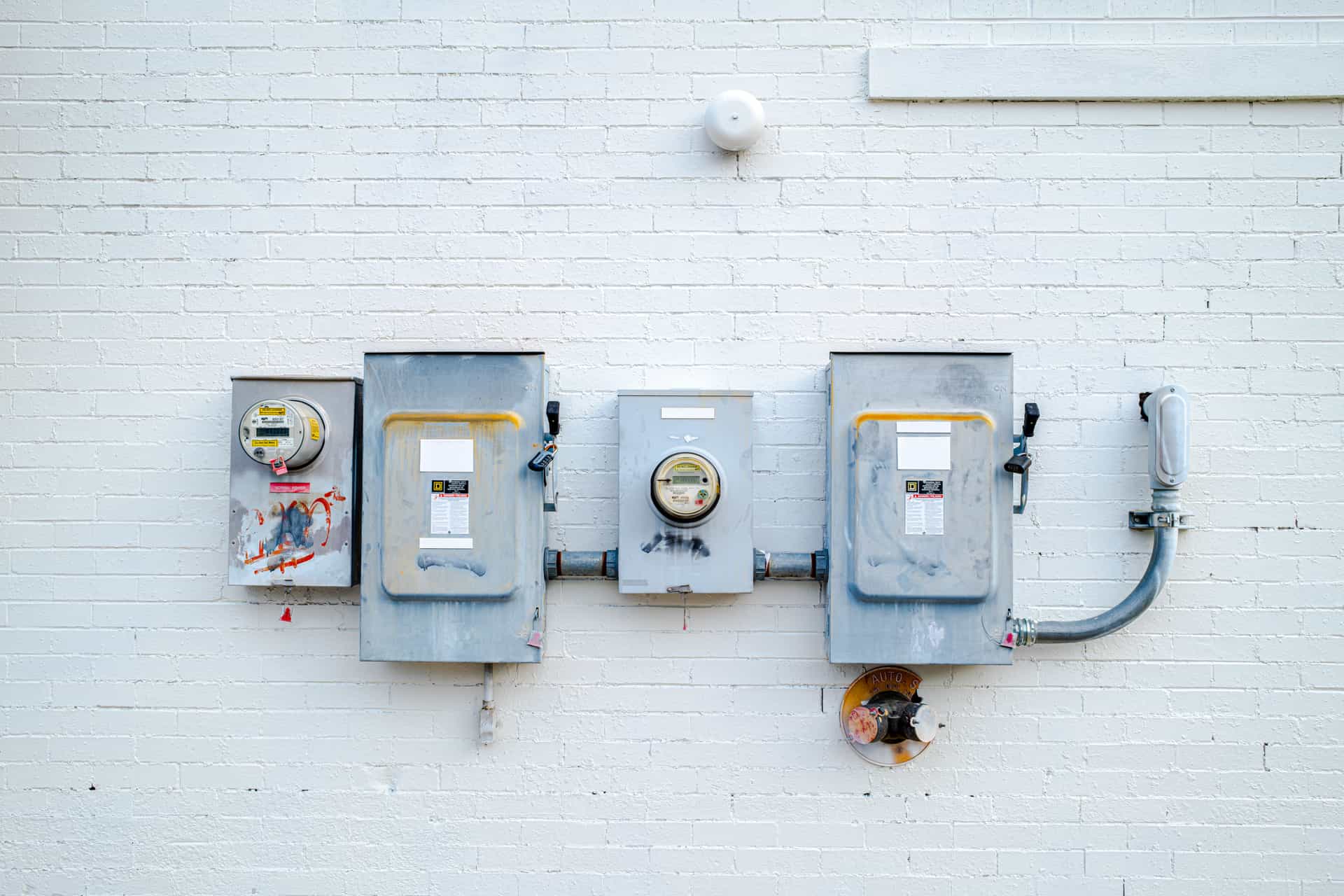 A domestic electricity meter on a wall