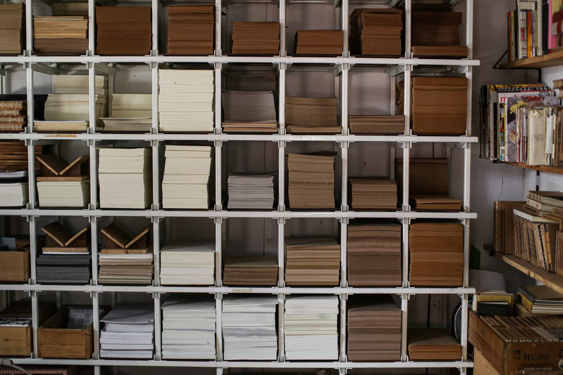 Replacement wick filters stacked on a shelf