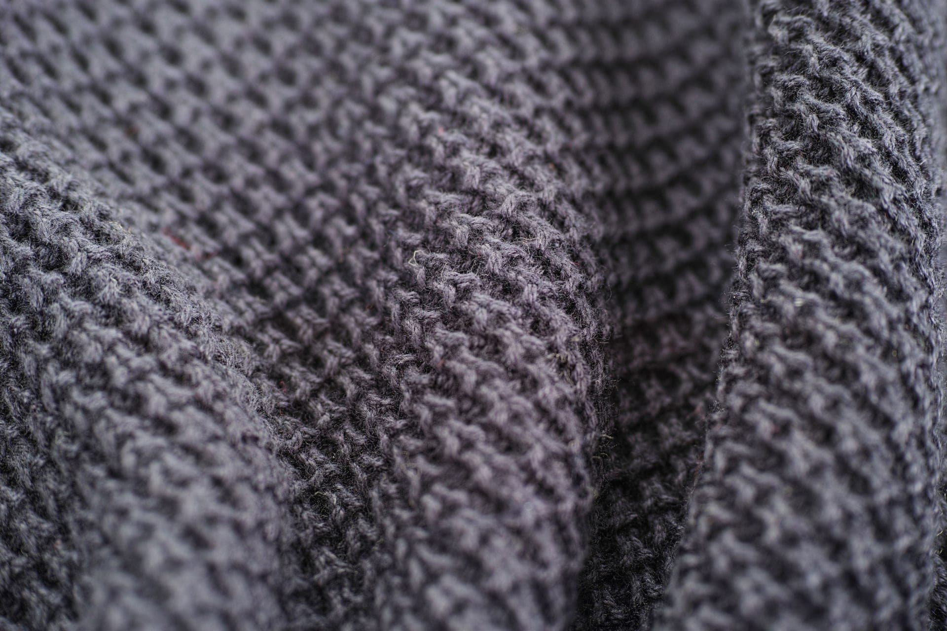 Close-up of a gray woolen knit fabric