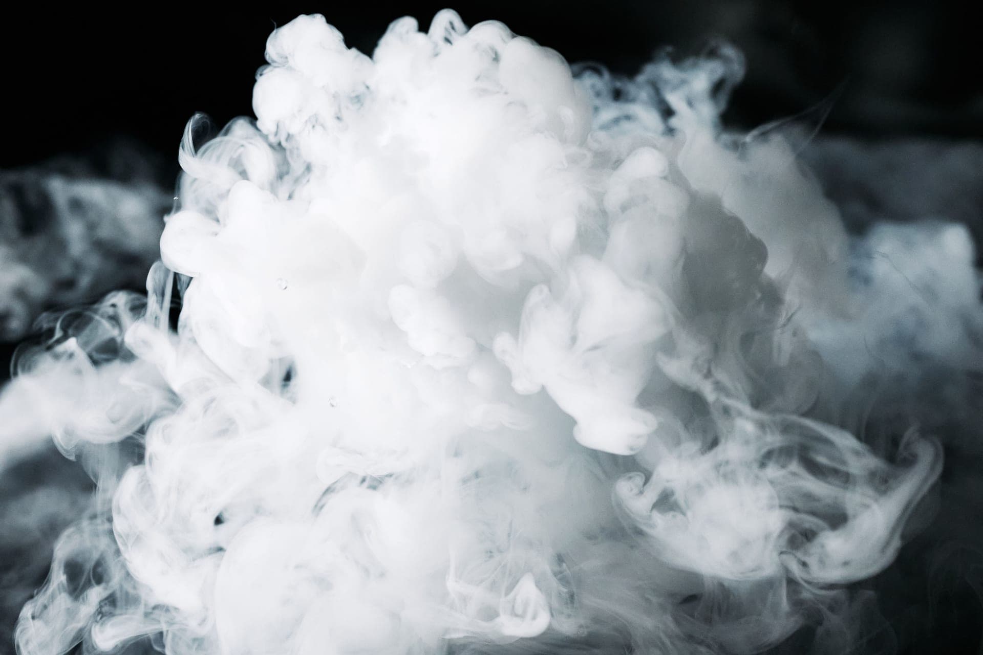 A cool mist plume rising from a small appliance