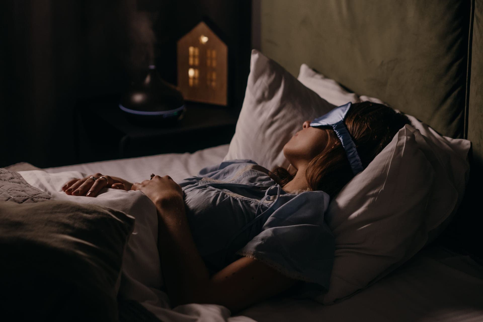 Steam rising in a dimly lit bedroom