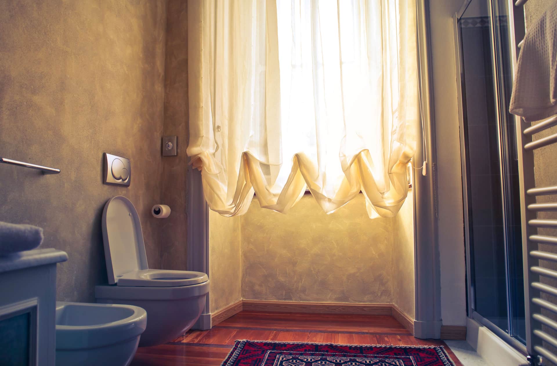 Low winter sun through a window onto a wooden floor